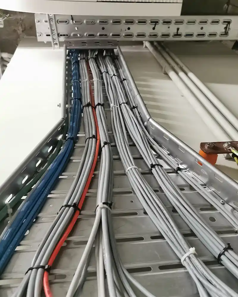 Neatly dressed Cat6 patch panel with labeled ports and Fluke certification in progress.